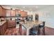 Modern kitchen with stainless steel appliances, wood cabinets, and granite countertops, creating a functional and stylish space at 316 Silverwood Dr, Dallas, GA 30157