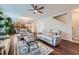 Open-concept living room featuring hardwood floors, access to the kitchen, and a cozy atmosphere at 316 Silverwood Dr, Dallas, GA 30157