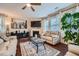 Cozy living room boasting hardwood floors, a fireplace, bright windows, and comfortable seating at 316 Silverwood Dr, Dallas, GA 30157