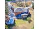 Aerial view of brick home showcasing the backyard, deck, and detached garage at 3970 Brenteresa Ct, Snellville, GA 30039