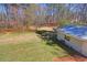Vast, well-maintained backyard with mature trees and a versatile outbuilding, creating a private oasis at 3970 Brenteresa Ct, Snellville, GA 30039