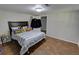 Bedroom with a bed, closet, and wood-look flooring at 3970 Brenteresa Ct, Snellville, GA 30039
