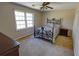 Bedroom showcasing a stylish bed and a ceiling fan at 3970 Brenteresa Ct, Snellville, GA 30039