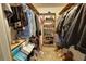 Walk-in closet with shelves and hanging storage, offering ample space for clothes and accessories at 3970 Brenteresa Ct, Snellville, GA 30039