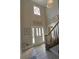 Foyer featuring tile flooring, staircase and a decorative window above front door at 3970 Brenteresa Ct, Snellville, GA 30039