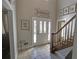 Bright foyer with tile floors and stairs leading to the upper level at 3970 Brenteresa Ct, Snellville, GA 30039