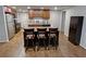 Kitchen with island and seating, stainless steel appliances, and ample cabinetry at 3970 Brenteresa Ct, Snellville, GA 30039
