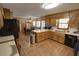 Cozy eat-in kitchen featuring wood cabinets and ample counter space at 3970 Brenteresa Ct, Snellville, GA 30039