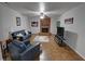Inviting living room features a brick fireplace, ceiling fan, and comfortable seating at 3970 Brenteresa Ct, Snellville, GA 30039