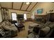 A living room with vaulted ceilings, a fireplace and comfortable furniture at 3970 Brenteresa Ct, Snellville, GA 30039