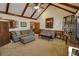 A living room with vaulted ceilings, a fireplace and comfortable furniture at 3970 Brenteresa Ct, Snellville, GA 30039