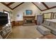 A living room with vaulted ceilings, a fireplace and comfortable furniture at 3970 Brenteresa Ct, Snellville, GA 30039