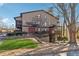 Two-story exterior with a small front yard and pergola covered walkways at 408 River Run Dr, Atlanta, GA 30350