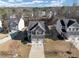 A stunning aerial view showcasing a charming house nestled between two houses at 7104 Skippingstone Way, Douglasville, GA 30134
