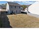 Large backyard with a wood fence, a patio, and space for outdoor activities at 7104 Skippingstone Way, Douglasville, GA 30134
