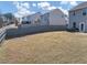Spacious backyard with privacy fence offering a secure and private outdoor space at 7104 Skippingstone Way, Douglasville, GA 30134