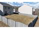 A spacious backyard with a wood fence, perfect for outdoor entertaining at 7104 Skippingstone Way, Douglasville, GA 30134