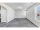 Bright and airy living room with comfortable carpet and ample space at 7104 Skippingstone Way, Douglasville, GA 30134