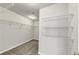 Walk-in closet with wire shelving providing ample storage space at 7104 Skippingstone Way, Douglasville, GA 30134
