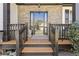 Welcoming front porch showcasing a stone facade, decorative railing, and a clear, inviting entrance at 7382 Gossamer St, Union City, GA 30291