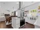 Modern kitchen flows into the dining area and living room at 7382 Gossamer St, Union City, GA 30291