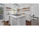 Modern kitchen features stainless steel appliances, sleek countertops, and lots of natural light at 7382 Gossamer St, Union City, GA 30291