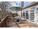 Wooden deck with seating and umbrella, perfect for outdoor entertaining at 1026 Wellesley Crest Dr, Woodstock, GA 30189