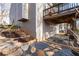 This home has an outdoor area with mature landscaping and a deck at 1026 Wellesley Crest Dr, Woodstock, GA 30189