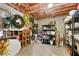 Unfinished basement with exposed ceiling, concrete floor, and pegboard wall at 1026 Wellesley Crest Dr, Woodstock, GA 30189
