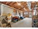 Unfinished basement with concrete floor, exposed ceiling, and natural light at 1026 Wellesley Crest Dr, Woodstock, GA 30189