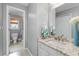 Bright bathroom with shower and tub, as well as single sink with white countertop at 1026 Wellesley Crest Dr, Woodstock, GA 30189