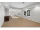 Bonus room with neutral carpet, natural light, recessed lights, and furniture at 1026 Wellesley Crest Dr, Woodstock, GA 30189