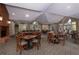 Inviting clubhouse interior featuring a fireplace, tables, and chairs, perfect for gatherings at 1026 Wellesley Crest Dr, Woodstock, GA 30189