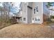 Two-story home with backyard, deck, and well-maintained lawn at 1026 Wellesley Crest Dr, Woodstock, GA 30189