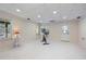 Bright basement area with carpeting and natural light, offering a versatile space at 3410 Kates Way, Duluth, GA 30097