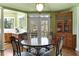 Bright breakfast nook with hardwood floors and views to the outdoors at 3410 Kates Way, Duluth, GA 30097