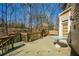 Spacious deck area for outdoor enjoyment with a view of the wooded lot at 3410 Kates Way, Duluth, GA 30097
