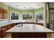 Spacious kitchen with countertops, center island, and hardwood floors at 3410 Kates Way, Duluth, GA 30097