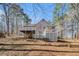 Exterior shot showing deck and gazebo overlooking landscaped backyard at 146 Crowell Se Rd, Conyers, GA 30094