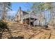 Exterior elevation showcasing large deck, gazebo, and backyard at 146 Crowell Se Rd, Conyers, GA 30094