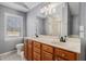 Charming bathroom with a double sink vanity, wood cabinets, and well-lit vanity area at 146 Crowell Se Rd, Conyers, GA 30094