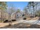 Attractive two-story home featuring a three-car garage situated on a spacious lot with mature trees at 146 Crowell Se Rd, Conyers, GA 30094