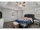 Spacious main bedroom with tray ceiling, plush carpet, and large windows providing natural light at 146 Crowell Se Rd, Conyers, GA 30094