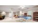 Spacious finished basement area with a ping pong table and ample room for activities at 2287 Lake Ridge Ter, Lawrenceville, GA 30043