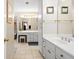 The bathroom has dual sinks, a vanity, and tile flooring at 2287 Lake Ridge Ter, Lawrenceville, GA 30043