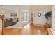 Elegant foyer with hardwood floors and a view into the bright living area at 2287 Lake Ridge Ter, Lawrenceville, GA 30043