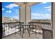 Cozy balcony features outdoor seating, offering stunning city views to enjoy morning coffee or evening sunsets at 2828 Peachtree Nw Rd # 1402, Atlanta, GA 30305