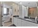 Modern bathroom with granite countertop, vessel sink, and glass enclosed shower at 2828 Peachtree Nw Rd # 1402, Atlanta, GA 30305