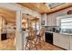 Kitchen bar with seating, connecting to the kitchen and another room at 637 Rock Springs Rd, Lawrenceville, GA 30043