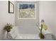 Relaxing bathroom features a soaking tub with chrome faucet and a view of nature at 9472 Cedar Grove Ct # 237, Jonesboro, GA 30238